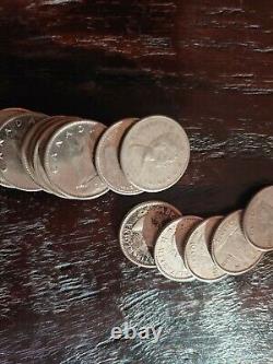 90% Silver Roosevelt Dimes and Canadian dimes. Roll of 50
